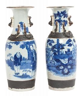 A Pair of Porcelain Asian Vases Height 11 3/4 x diameter 4 1/2 inches.