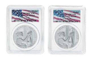 A Pair of United States 2011-W September 11, 2001 Memorial Limited Edition First Strike 1 Oz. Silver Medals