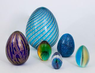 GROUP OF SIX GLASS EGGS