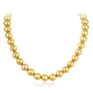 A Gold Bead Necklace