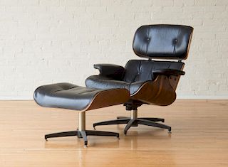 LEATHER, VINYL AND ROSEWOOD VENEER ARMCHAIR AND OTTOMAN, STYLE OF CHARLES AND RAY EAMES