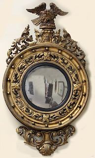 LARGE CARVED AND GILDED CONVEX MIRROR