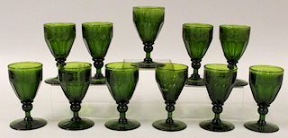 (on 11) SET OF GREEN GLASS FOOTED WINES