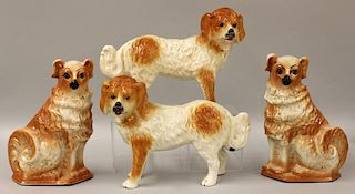 (on 4) PAIR OF ENGLISH STAFFORDSHIRE SEATED RUBY SPANIELS