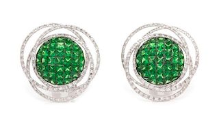 A Pair of 18 Karat White Gold, Invisibly Set Tsavorite Garnet and Diamond Earclips, 6.40 dwts.