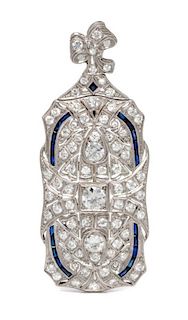 An Art Deco Platinum, Diamond and Synthetic Sapphire Pendant/Brooch, 10.90 dwts.