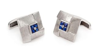 A Pair of 14 Karat White Gold and Synthetic Sapphire Cufflinks, 10.20 dwts.