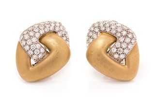 A Pair of 18 Karat Bicolor Gold and Diamond Earclips, 12.90 dwts.