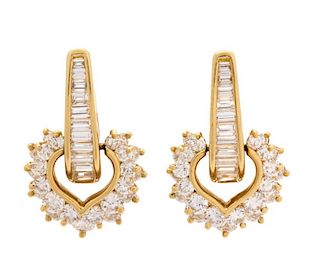 A Pair of 18 Karat Yellow Gold and Diamond Earclips, 6.50 dwts.