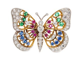 A Platinum Topped Gold, Diamond and Multigem Butterfly Brooch, 7.40 dwts.
