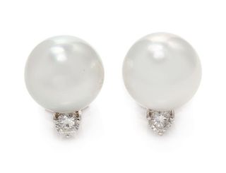 An 18 Karat White Gold, Cultured South Sea Pearl and Diamond Earclips, 5.40 dwts.