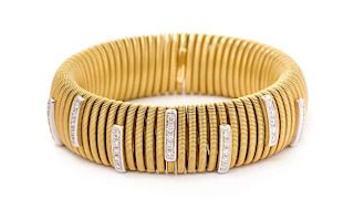 An 18 Karat Bicolor Gold and Diamond Stretch Bracelet, Italian, 52.60 dwts.