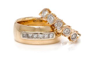 A Collection of 14 Karat Yellow Gold and Diamond Rings, 11.90 dwts.