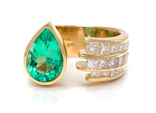 An 18 Karat Yellow Gold, Emerald and Diamond Ring, 10.20 dwts.