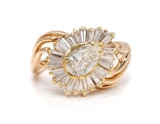 A 14 Karat Yellow Gold and Diamond Cluster Ring, 3.40 dwts.