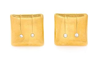 A Pair of 18 Karat Yellow Gold and Diamond Earclips, 17.10 dwts.