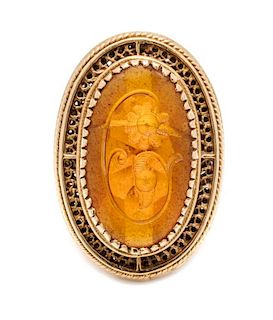 A Yellow Gold and Citrine Intaglio Ring, 10.10 dwts.