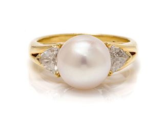 An 18 Karat Yellow Gold, Cultured Pearl and Diamond Ring, 3.90 dwts.