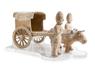 A Pottery Model of an Ox Cart with Two Standing Attendants
