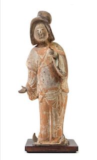 A Painted Pottery Figure of a Fat Lady
