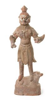 A Painted Pottery Figure of a Guardian