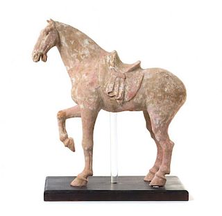 A Large Painted Pottery Figure of a Prancing Horse