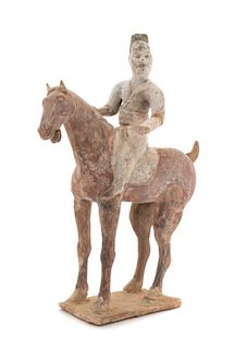 A Painted Pottery Equestrian Figure