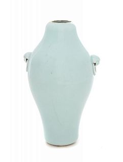 A Celadon Glazed Porcelain Vase Height 8 inches.