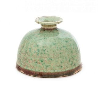A Peachbloom Glazed Porcelain Water Pot, Taibaizun Height 3 1/4 inches.