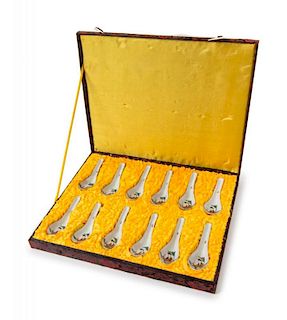 A Set of Twelve Famille Rose Porcelain Spoons Length of each 5 1/2 inches.