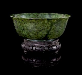A Carved Spinach Jade Bowl Diameter 7 inches.