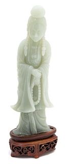 A Carved Celadon Jade Figure of Guanyin