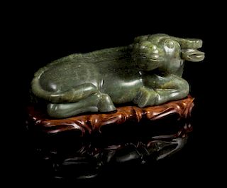 A Carved Spinach Jade Figure of a Water Buffalo