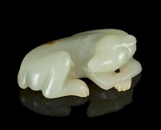 A Carved White Jade Figure of a Dog