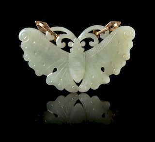 A Celadon Jade 'Butterfly'-Form Pendant