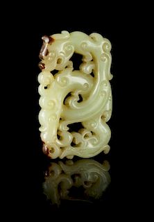 A Carved Yellow Jade Dragon Pendant