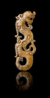 A Pierce Carved Russet Jade 'Dragon' Pendant