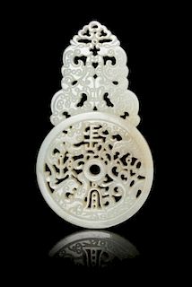 A Pierced and Carved Celadon Jade Plaque