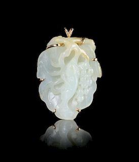 A Carved White Jade and 14K Gold Brooch