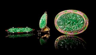 Three Jadeite and Yellow Gold Mounted Articles Length of largest 2 1/2 inches.