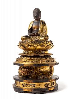 A Gilt Lacquered Wood Figure of a Buddha