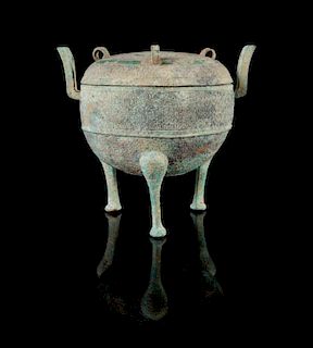 An Archaic Bronze Ding Vessel