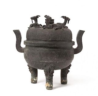 An Archaistic Bronze Covered Ding Vessel