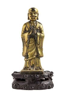 A Gilt Bronze Figure of a Monk