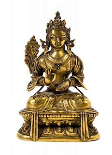 A Sino-Tibetan Gilt Bronze Figure of a Bodhisattva Height 4 1/2 inches.
