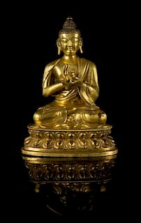 A Gilt Bronze Figure of Buddha Height 6 1/4 inches.