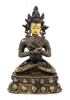 A Sino-Tibetan Gilt Bronze Figure of a Bodhisattva Height 8 1/2 inches.