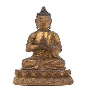 A Small Gilt Wood Figure of Buddha