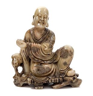 A Carved Soapstone Figure of Luohan