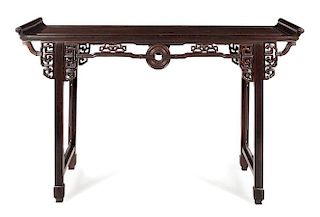 A Carved Rosewood Altar Table, Qiaotou'an Height 44 3/4 x width 73 1/4 x depth 20 1/2 inches.